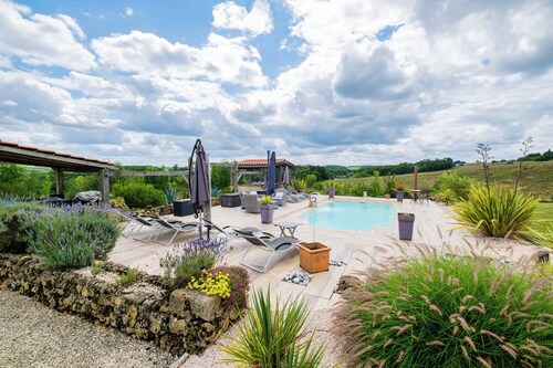 ELEGANT CHARACTER-FILLED PROPERTY WITH STUNNING POOL