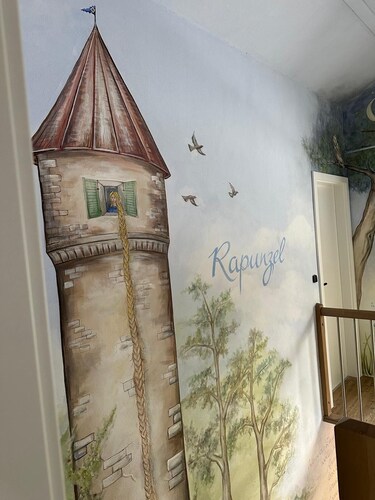 A magical vacation rental on the upper floor. Seats up to 4 people.