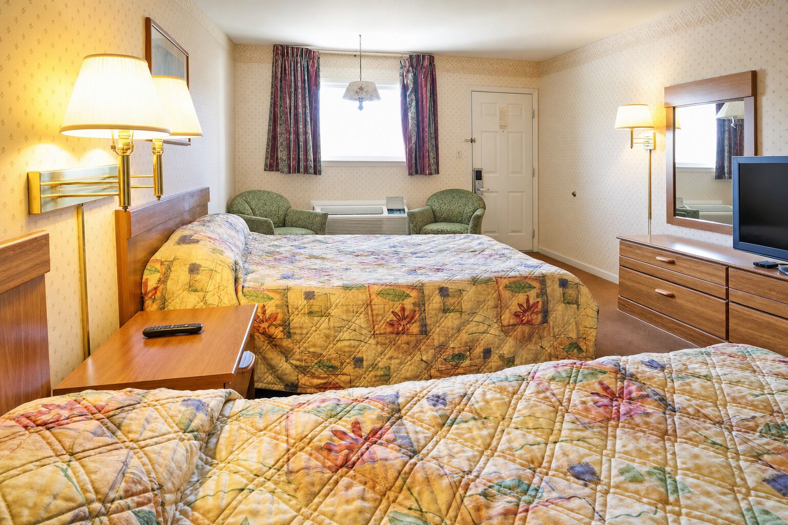 Stretch out and relax with lounge chairs by the window.