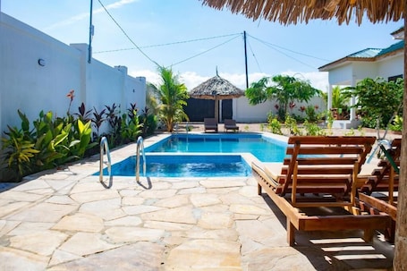 Outdoor pool. Makazi Garden Villas