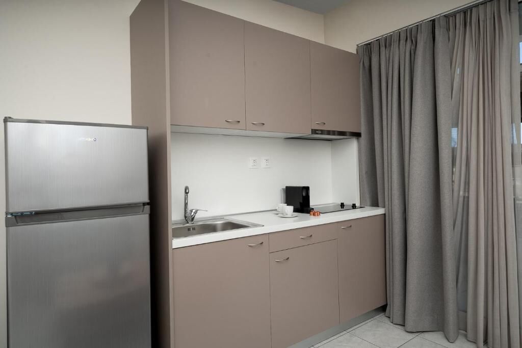 Departamento, balcón, vista a la ciudad | Cocina privada | Cafetera y tetera, tetera eléctrica y artículos de limpieza 