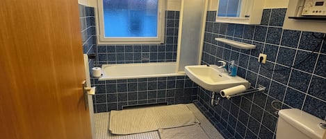 Hair dryer, towels, soap, toilet paper