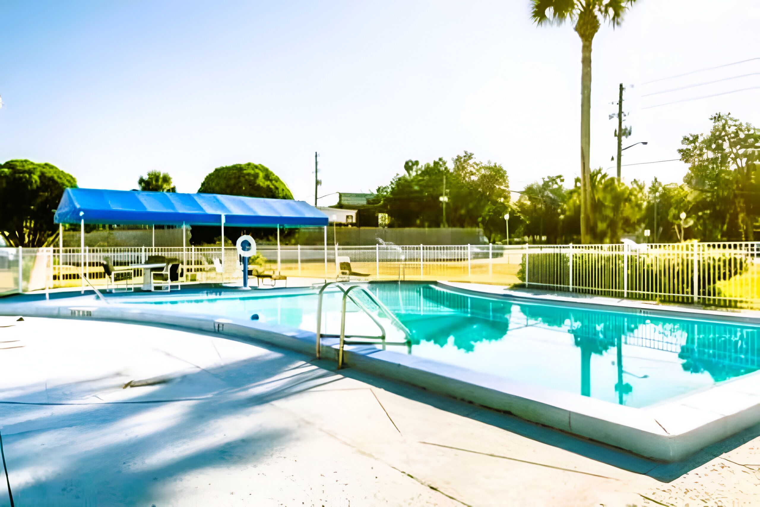 Lounge poolside under open skies for an easy afternoon unwind.