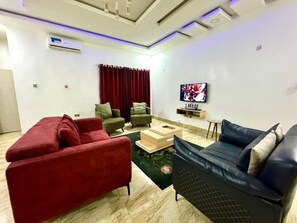 Economy Apartment, Balcony, City View | Living area - Tupon Luxury Apartment (Abuja)
