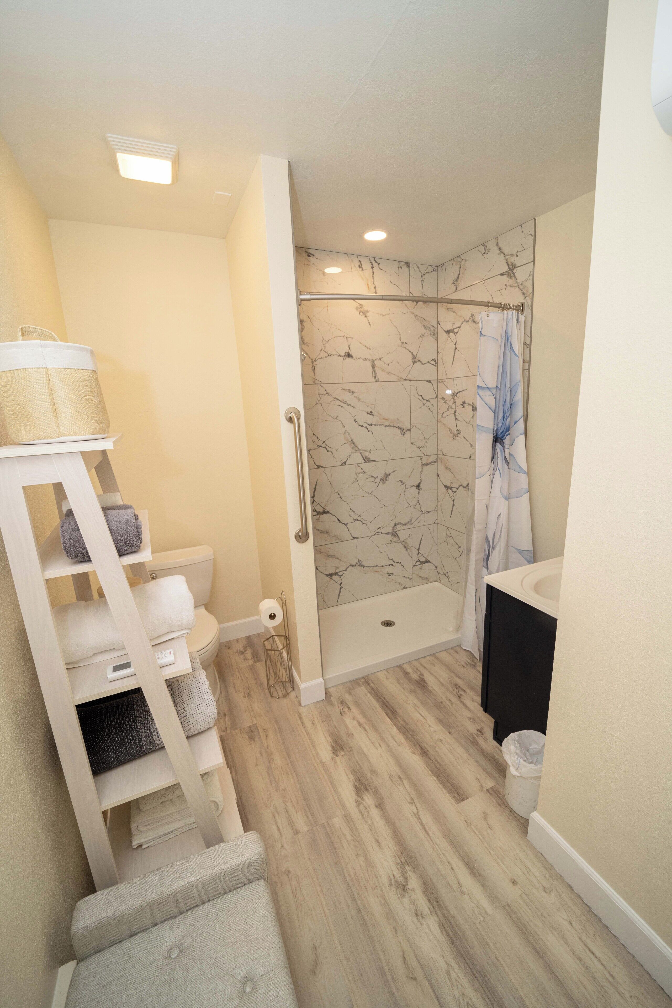 Hair dryer, towels, soap, toilet paper