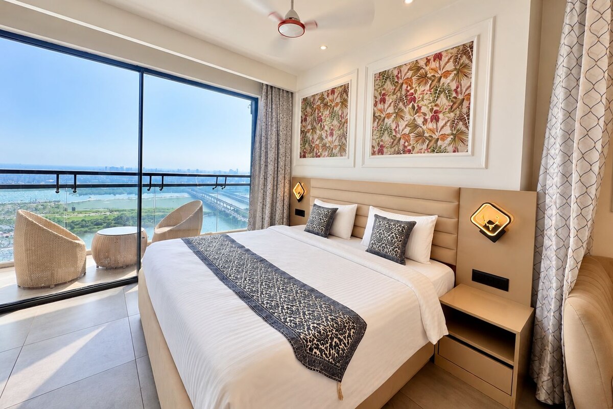 Luxury Studio Suite, 1 Bedroom, Balcony, River View | Desk, laptop workspace, blackout drapes, iron/ironing board (on request)