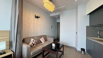 Suite Studio Standard, balcon, vue fleuve | Coin séjour