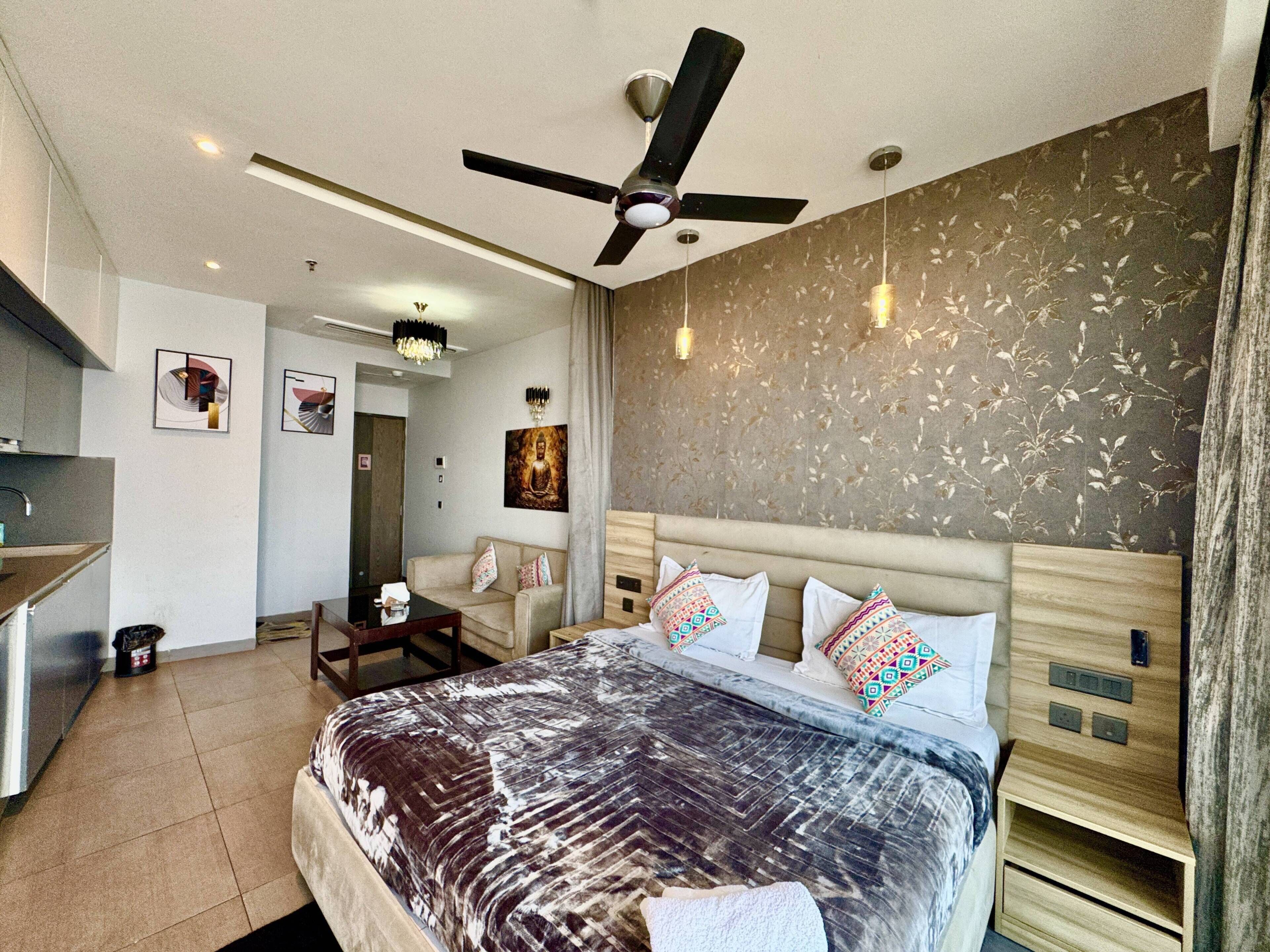 Panoramic Studio Suite, Balcony, River View | Individually furnished, desk, laptop workspace, blackout curtains