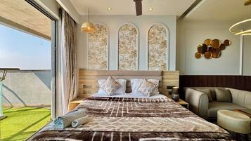 Elite Studio Suite, Balcony, River View | Desk, laptop workspace, blackout drapes, iron/ironing board