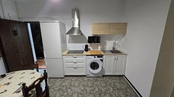 Een magnetron, een oven, een kookplaat