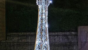 A model of the Eiffel Tower at night.