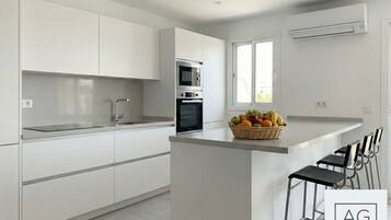 Luxury Penthouse, Beach View | Private kitchen | Full-size fridge, microwave, oven, stovetop