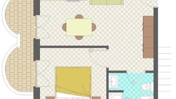 A floor plan of a hotel room with a kitchen, dining area, and a bathroom.