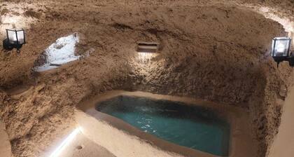 Micaela Cave. Swimming pool in cave and sea views.
