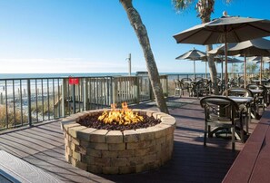 Outdoor dining - Beachfront Oasis | Lazy River, Pools, Spa + Near SkyWheel & Broadway Dining (Myrtle Beach)