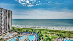 A hotel with multiple swimming pools, a beach, and a view of the ocean. - Family Villa w/ Lazy River & Beach Access | Near Attractions (North Myrtle Beach)