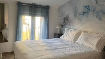 3 dormitorios, tabla de planchar con plancha, wifi y ropa de cama