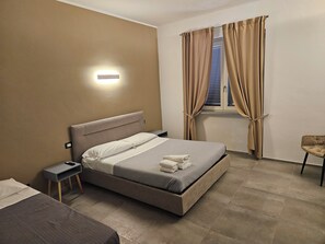 2 chambres, fer et planche à repasser, accès à Internet, literie fournie