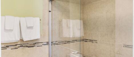 Shower, hair dryer, towels, soap