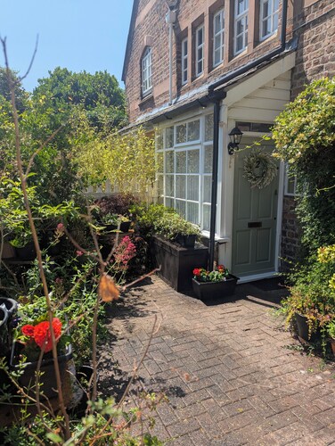 Coach house cottage by sefton park, built in 1850.  Entire house !