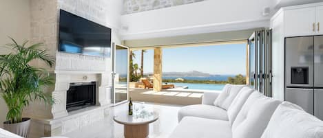 Luxury Villa | Living area | 50-inch Smart TV with digital channels, Netflix, streaming services