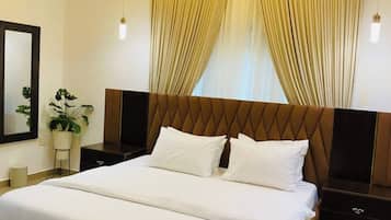 Desk, laptop workspace, blackout curtains, soundproofing