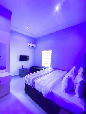 Family Room, Balcony, City View | Desk, laptop workspace, blackout drapes, soundproofing - Adna Hotel (Lagos)