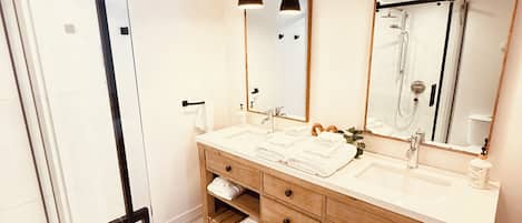 Shower, hair dryer, towels, soap