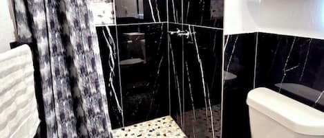 Shower, hair dryer, towels, soap