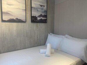 1 habitación, tabla de planchar con plancha, wifi y ropa de cama 