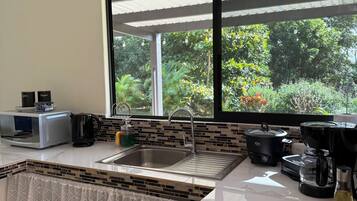 Microwave, electric kettle, toaster, cookware/dishes/utensils