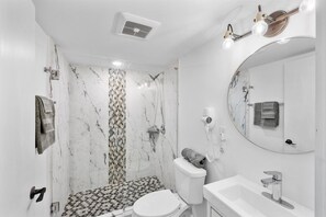 Hair dryer, towels, soap, toilet paper