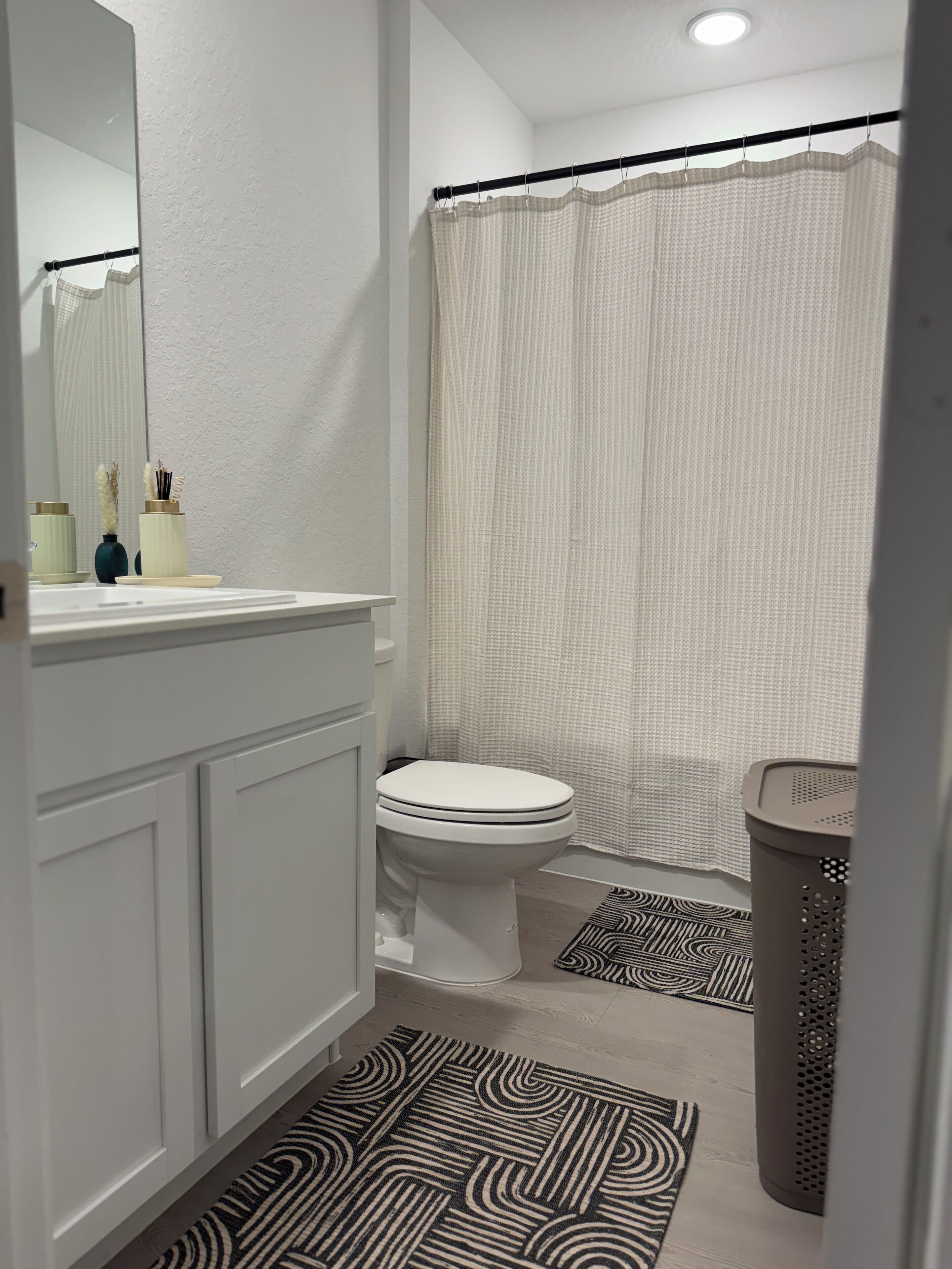 Hair dryer, towels, soap, toilet paper