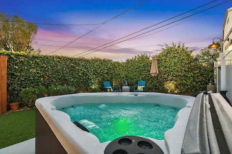 Outdoor spa tub. Private Guest Suite w/ Hot Tub, Fireplace & Yard