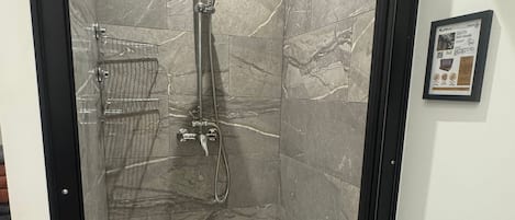 Shower, hair dryer, towels, soap