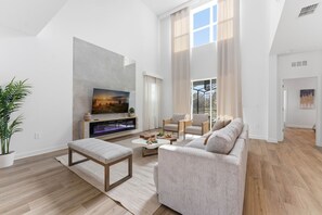 House (5 Bedrooms) | Living area | 50-inch Smart TV with cable channels - Stylish Family Villa, Themed Rooms, Pool (Kissimmee)