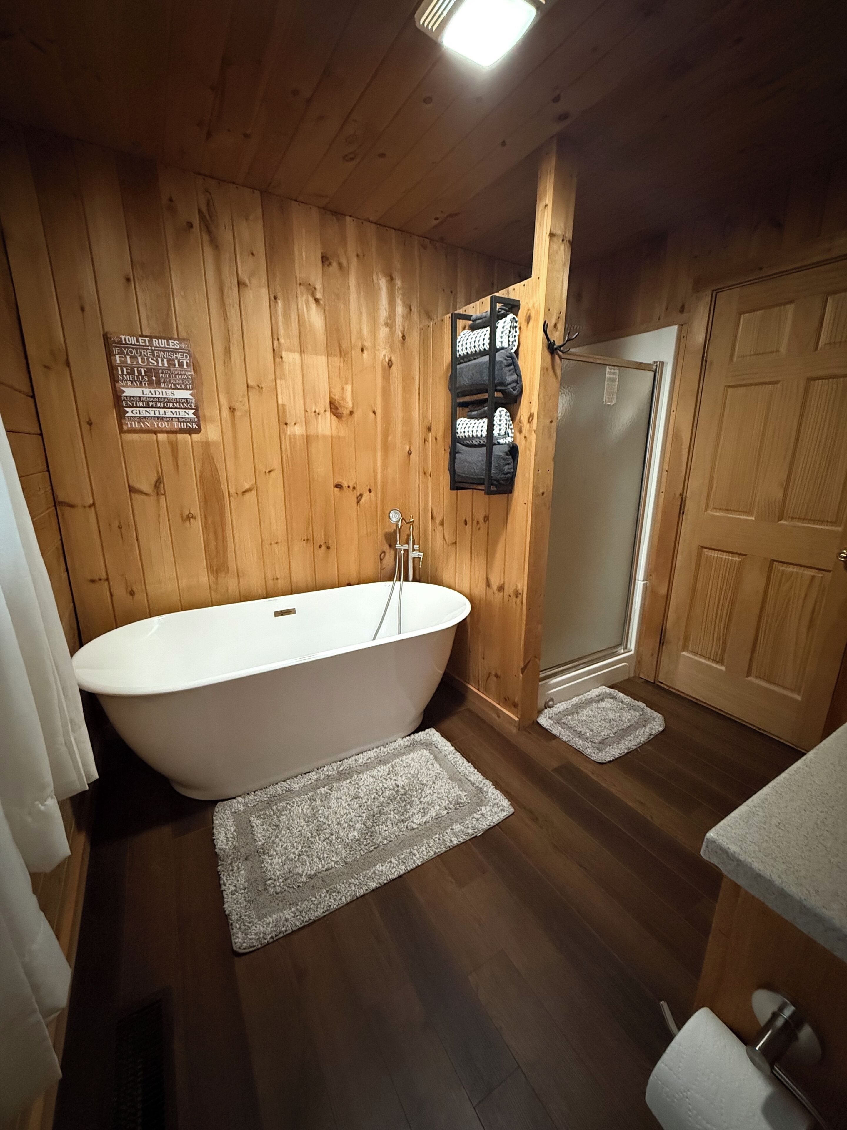 Shower, towels, soap, toilet paper