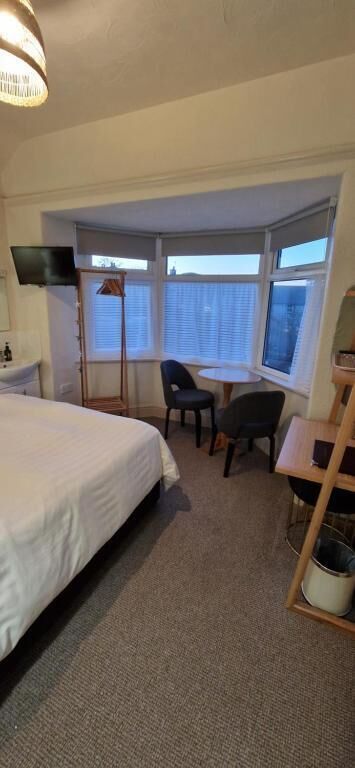 Superior Double Room, Partial Sea View | Blackout drapes, iron/ironing board, free WiFi