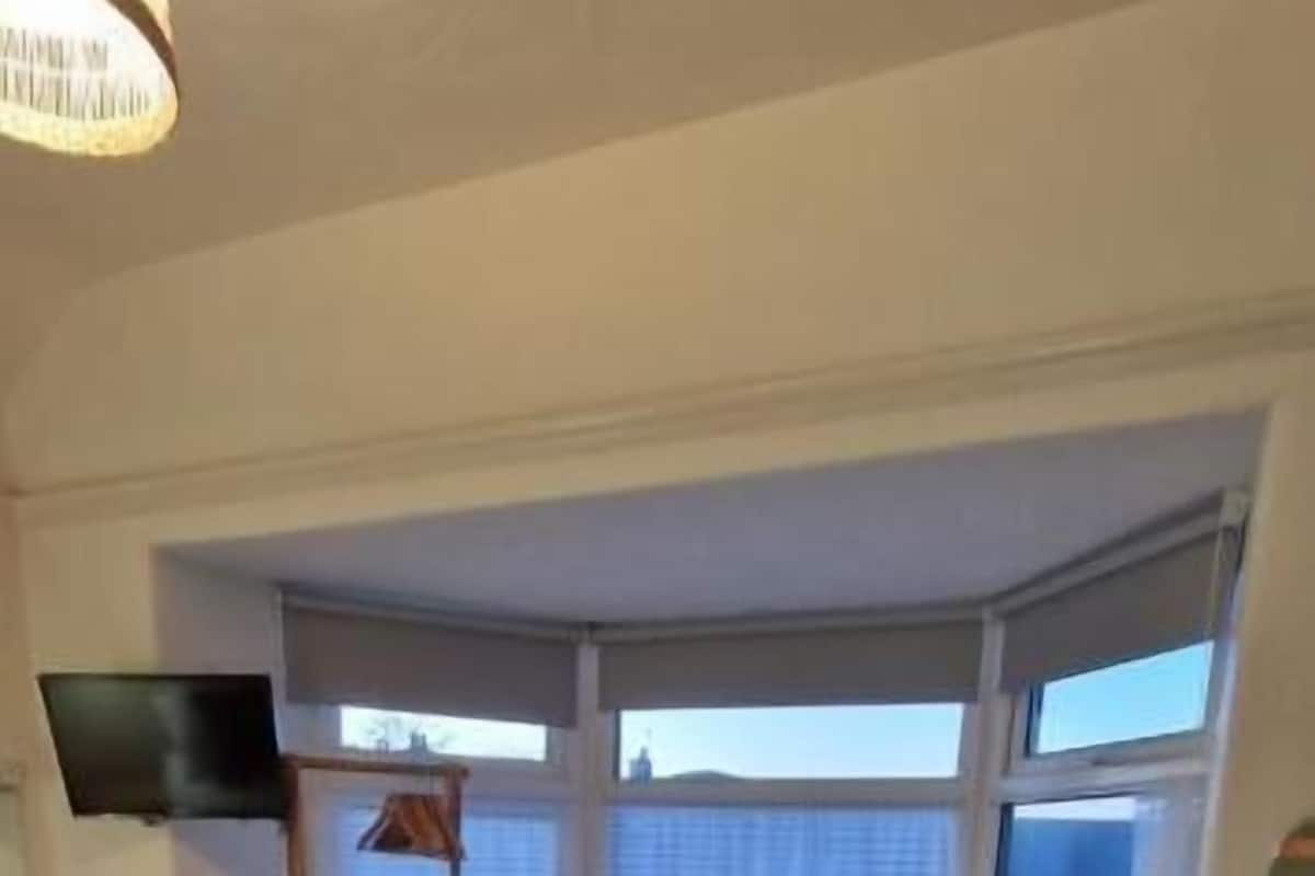 Superior Double Room, Partial Sea View | Blackout drapes, iron/ironing board, free WiFi