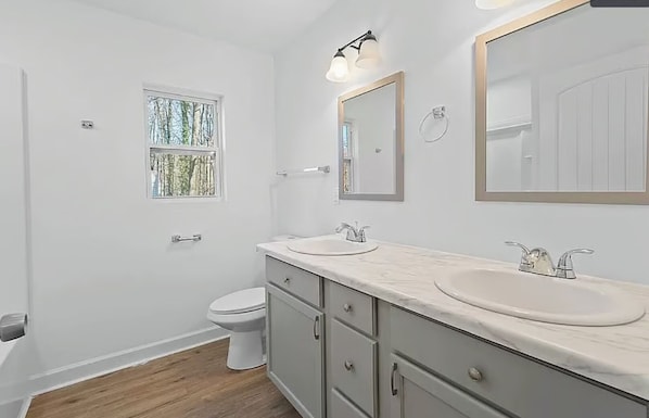 Hair dryer, towels, soap, toilet paper