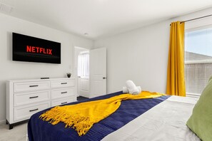 4 bedrooms, desk, iron/ironing board, travel crib