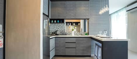 Fridge, microwave, stovetop, coffee/tea maker