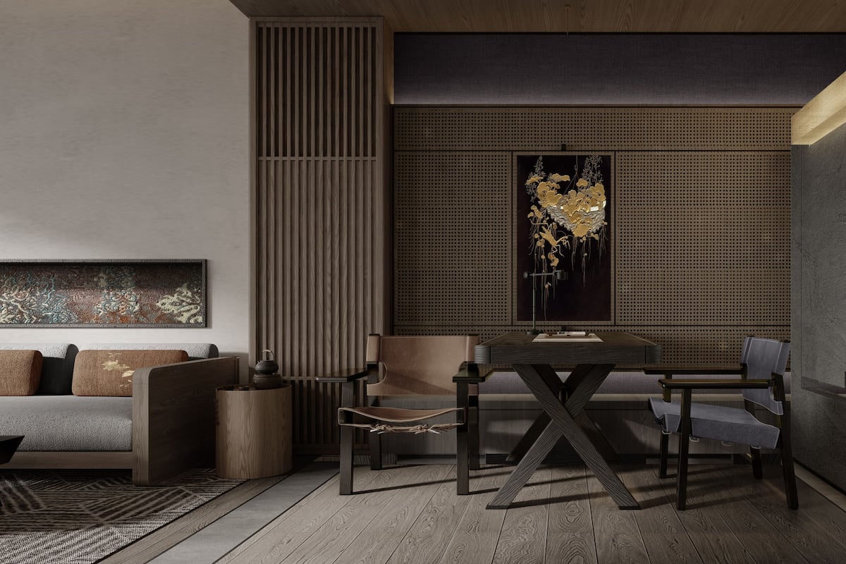 Un interior moderno con un sofá, una mesa de comedor, sillas y un elemento decorativo en la pared.