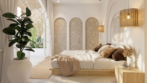 Ein Schlafzimmer mit einem Bett, einem Deckenventilator, einer großen Topfpflanze und Blick durch ein Fenster.