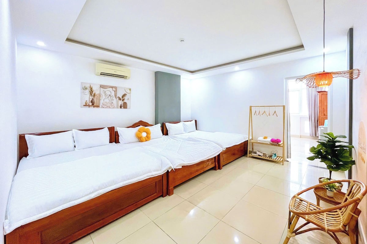 Standard Family Room | Minibar, individually furnished, desk, blackout drapes