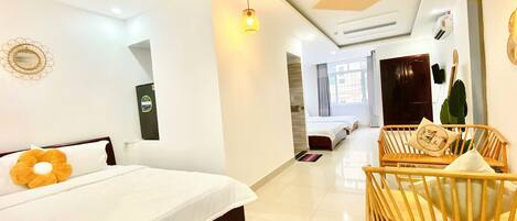 Family Room, Balcony | Minibar, individually furnished, desk, blackout curtains
