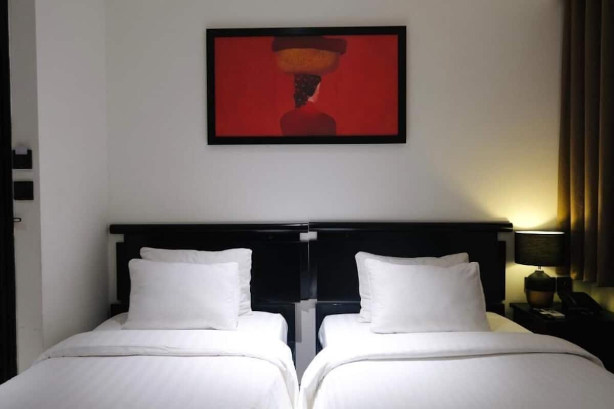 Deluxe Double or Twin Room, City View | In-room safe, blackout drapes, soundproofing, iron/ironing board