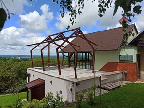 A modern house with a rooftop terrace, a brick wall, and a view of the countryside. - Marijan by Interhome (Ljutomer)