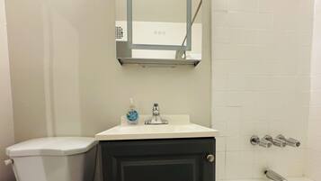 Hair dryer, towels, soap, toilet paper