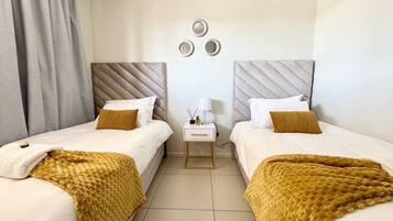 2 habitaciones, tabla de planchar con plancha, wifi y ropa de cama